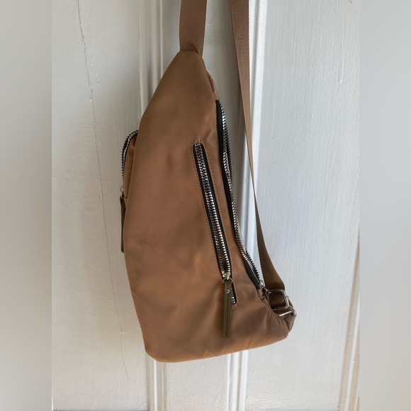 Adrienne Vittadini® Tan
Sport Collection Unisex Nylon Sling
Bag - Picture 3 of 7